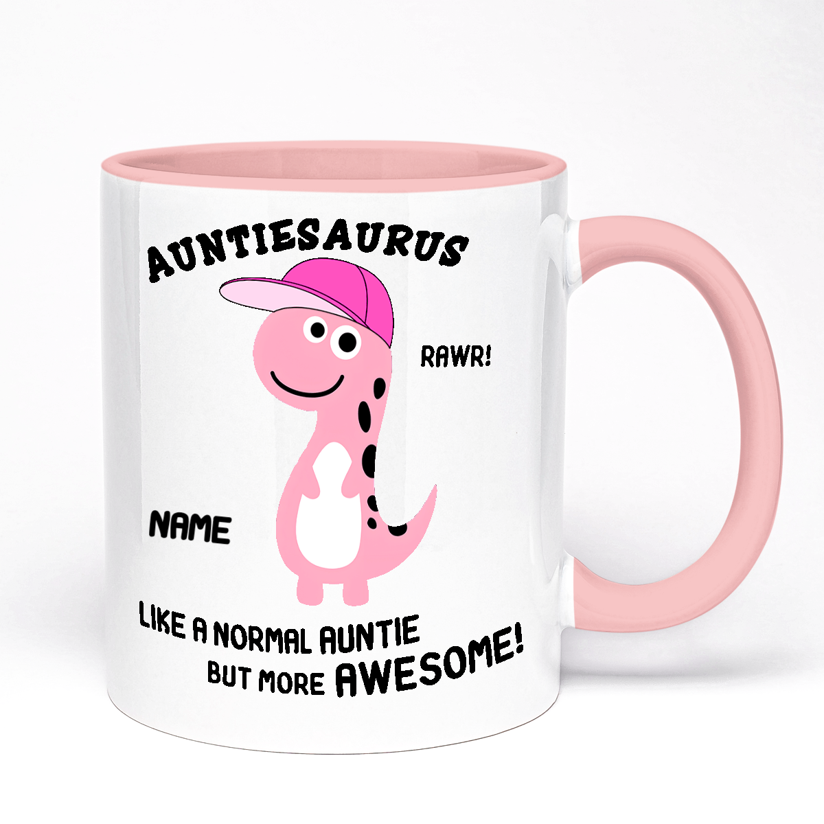 A pink ceramic mug with a whimsical design featuring a dinosaur character with the text 'AUNTIESAURUS' and the option to customize a name and add a message.