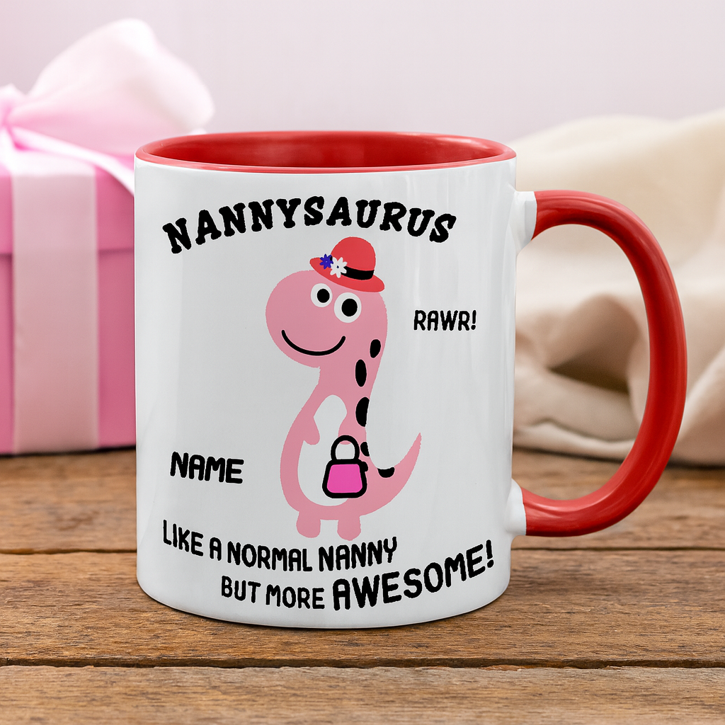 Mug with pink dinosaur illustration and text on a wooden surface