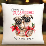 A square cushion with an adorable pug design, featuring two pugs in a basket with Christmas decorations and the text 'Sending you Pugs and Kisses This holiday season'.