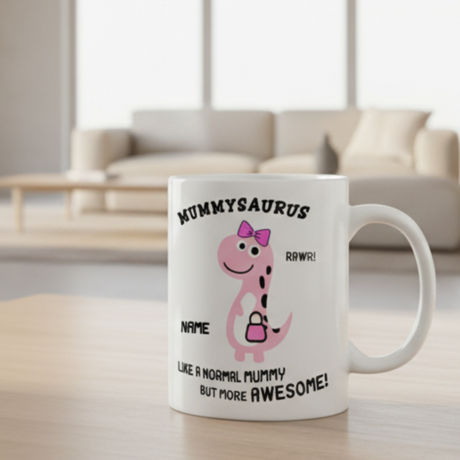 White mug with pink dinosaur design and text in a living room setting