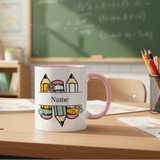 Mug with colorful pencil design on a desk in a classroom setting