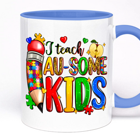A white ceramic mug with a colorful design featuring a teacher, a pencil, and apple, surrounded by puzzle pieces, stars, and the text 'I teach AWESOME kids'.