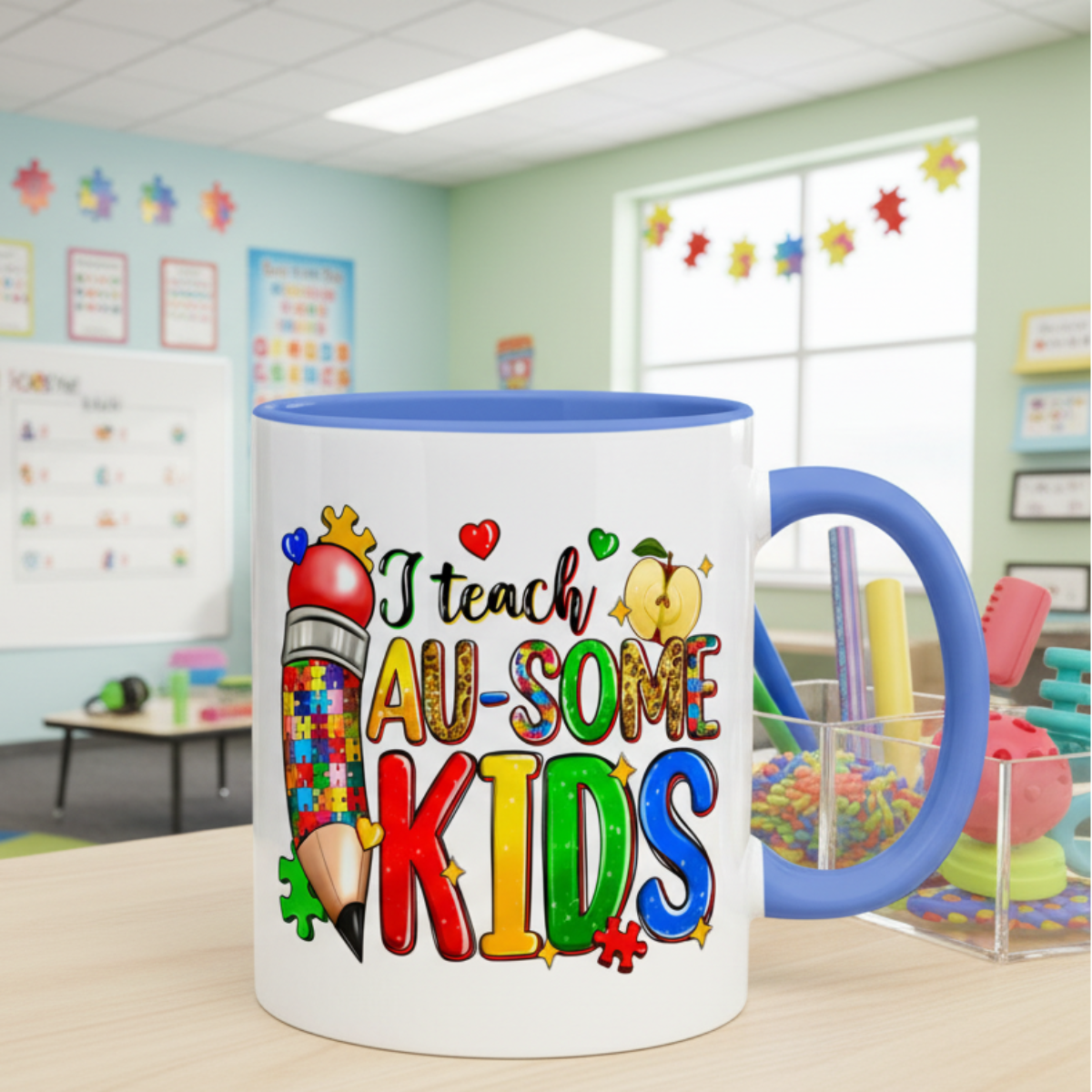 A white ceramic mug with a colorful design featuring a teacher, a pencil, and apple, surrounded by puzzle pieces, stars, and the text 'I teach AWESOME kids'.