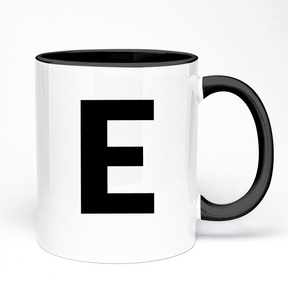A white ceramic mug with a black handle and black letter 'E' on the front.