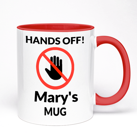 White mug with red interior and handle, featuring 'HANDS OFF! Mary's MUG' text and design.